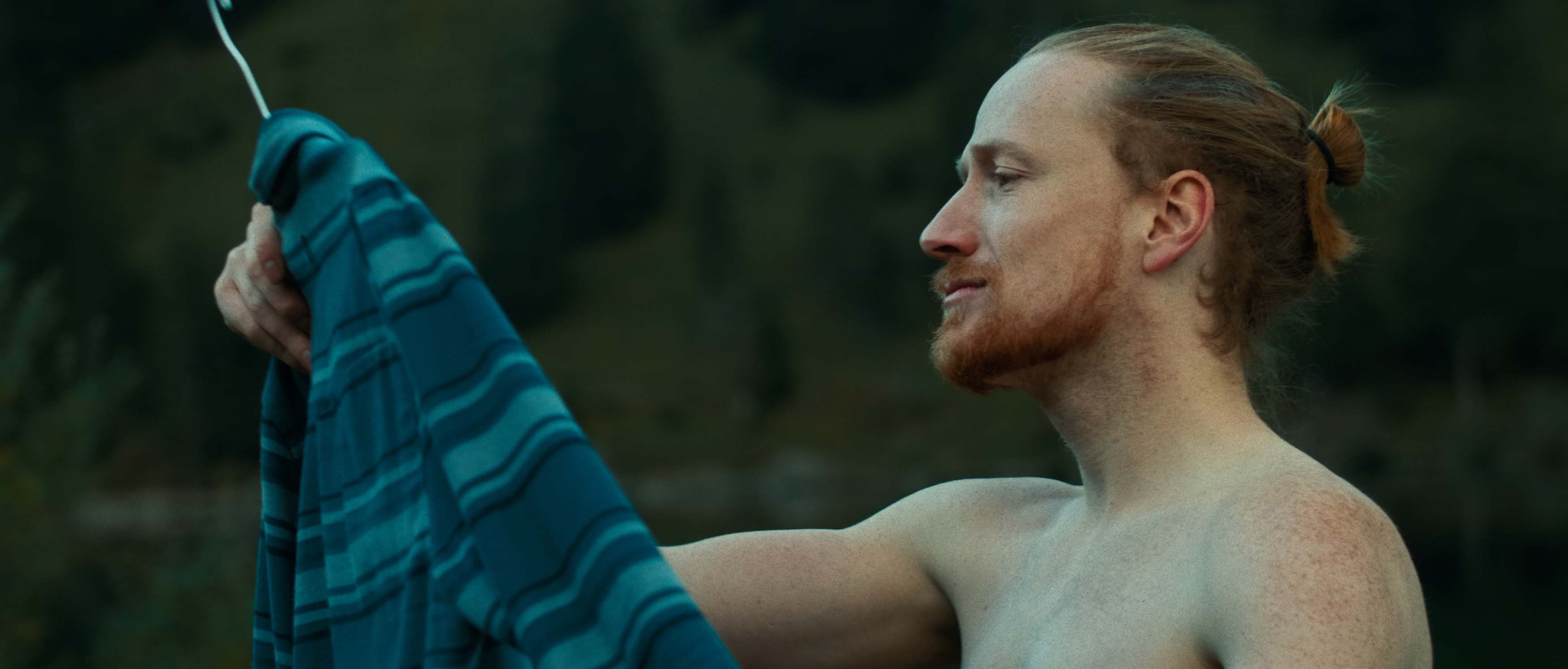 shirtless men selecting clothes Simon Abele