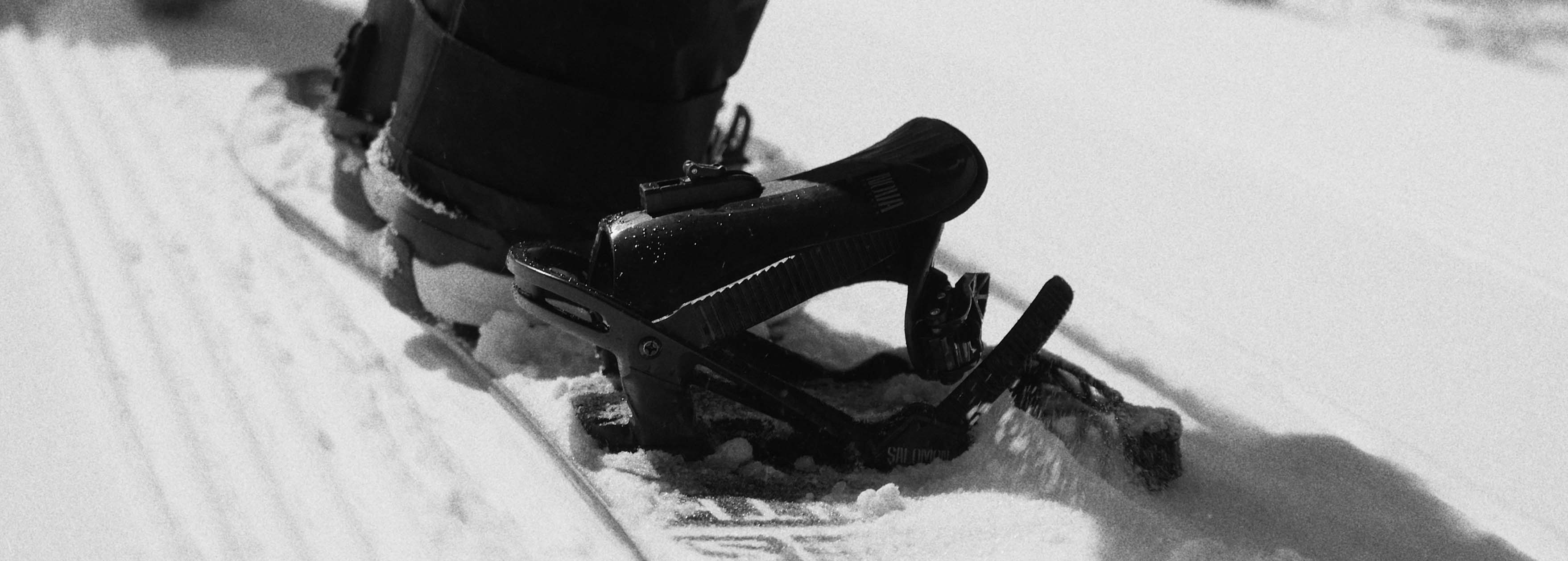 Snowboard on slopes closeup Simon Abele